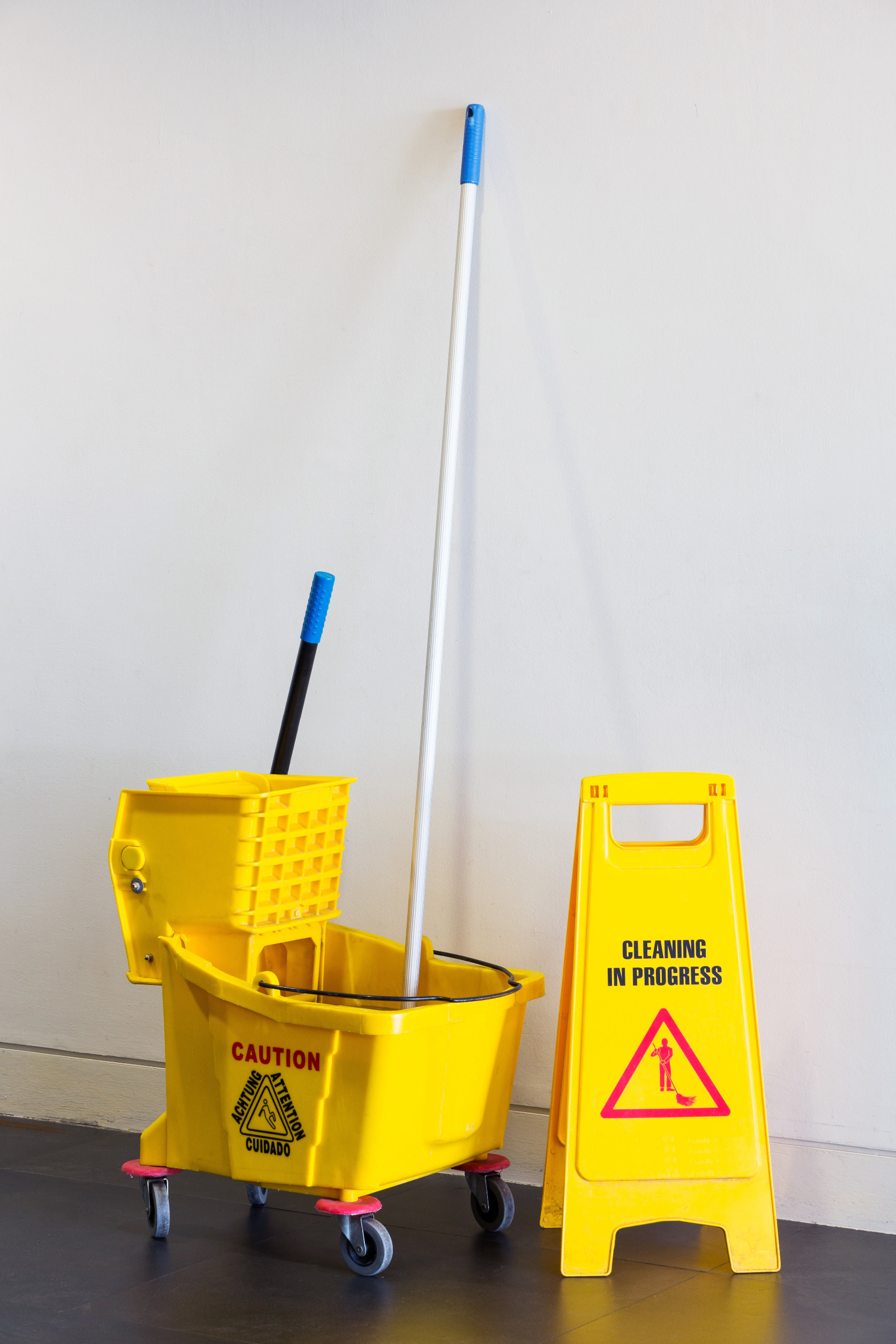 mop and bucket post -construction cleaning