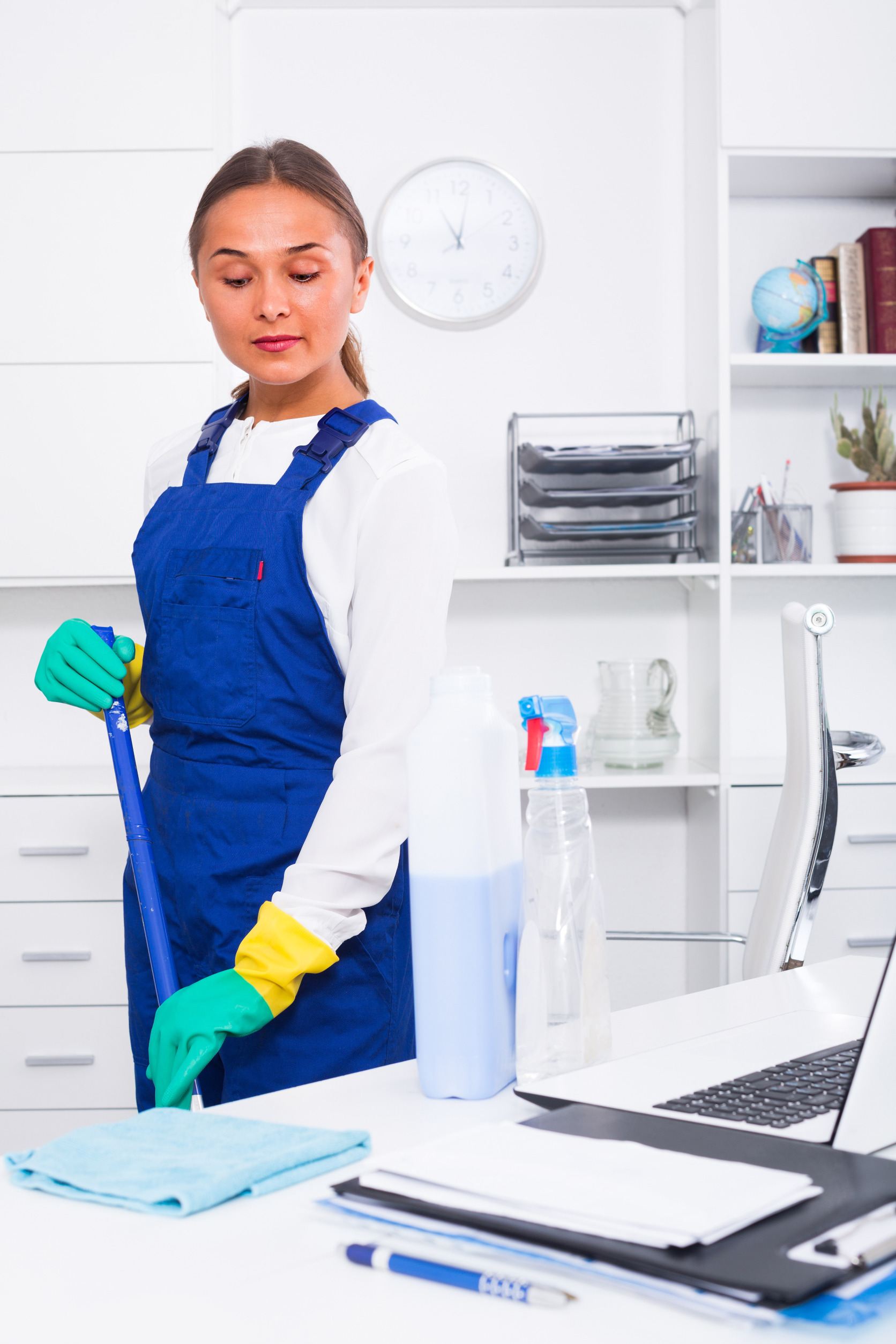 woman cleaning a medical office